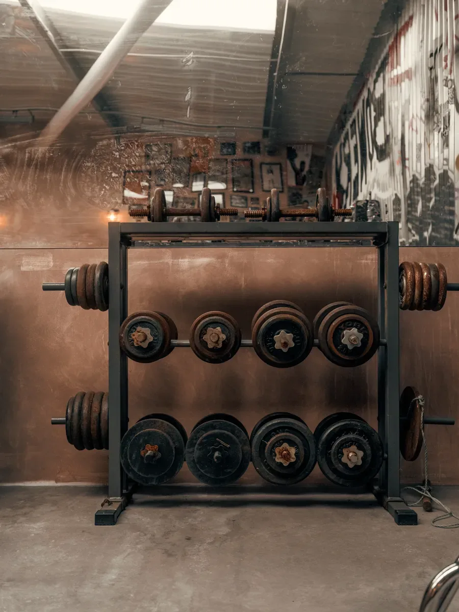 Vintage weight rack and plates in The Bowery