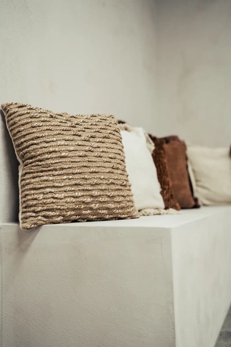 Textured cushion styling detail in Cover Story