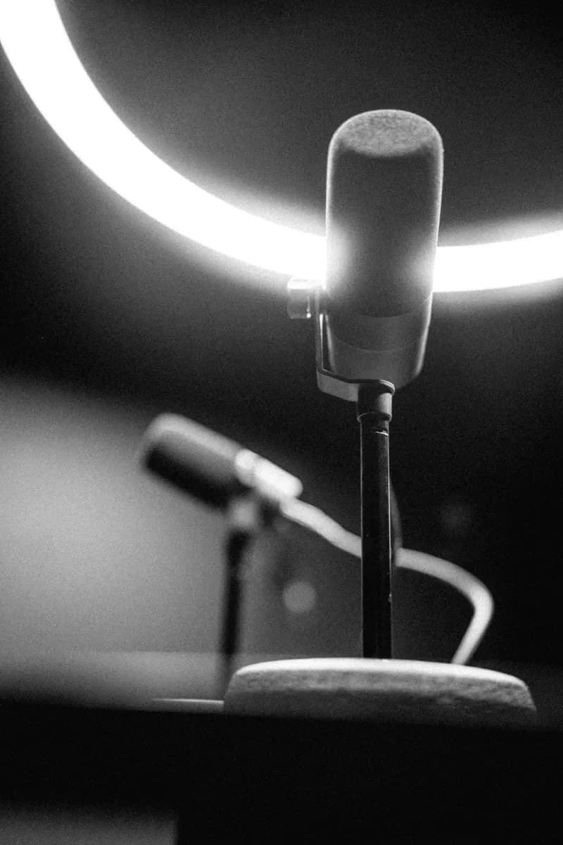 Black and white microphone detail under the halo light in The Round Table