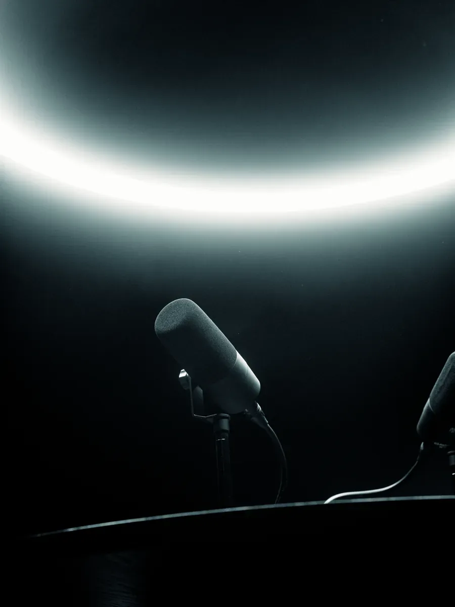 A microphone lit by the halo ring in The Round Table