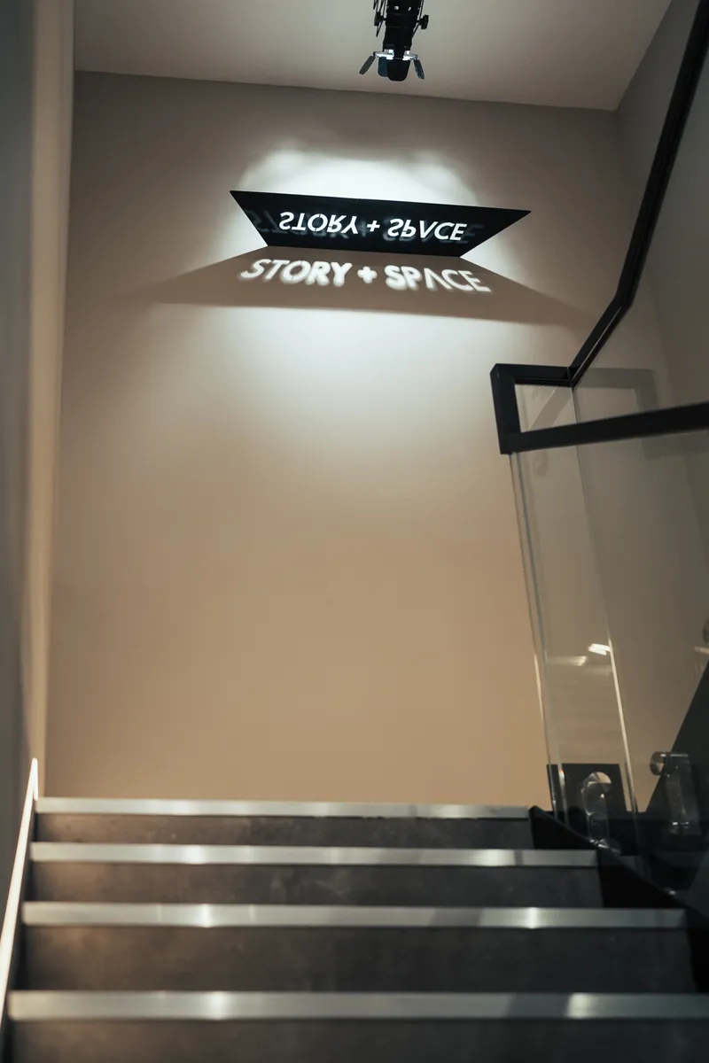 Story + Space sign above the stairwell