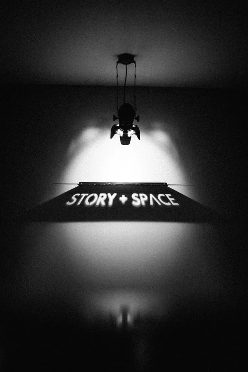 Story + Space signage caught in a beam of light