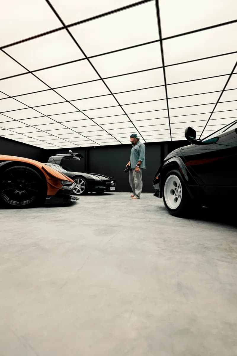 The photographer at work between the three cars in The Neon