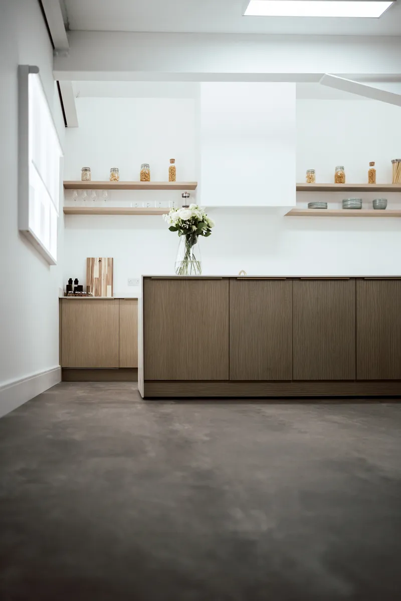 Open shelving and glassware in the light kitchen in The Pass