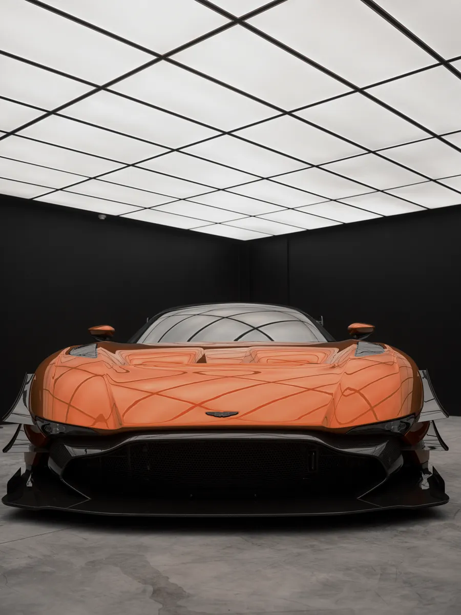 Aston Martin Vulcan head-on under the illuminated ceiling